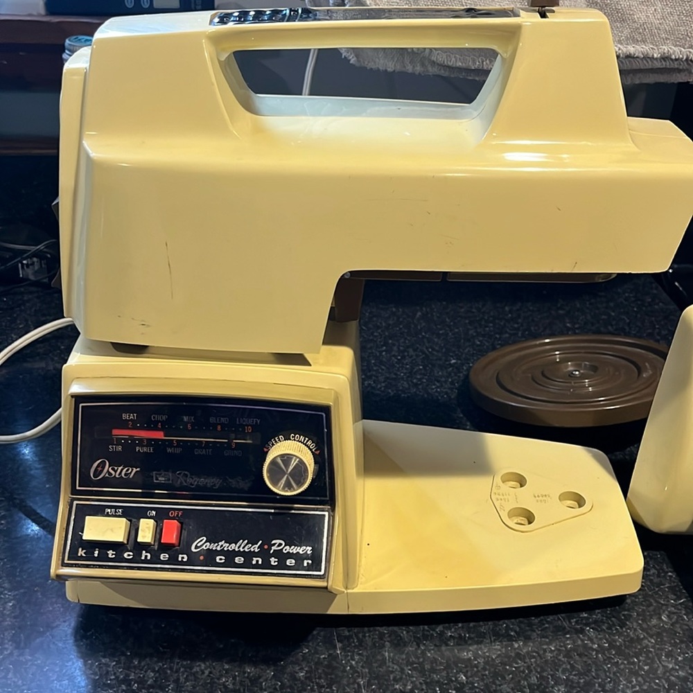 Vintage Oster controlled power kitchen center with attachments